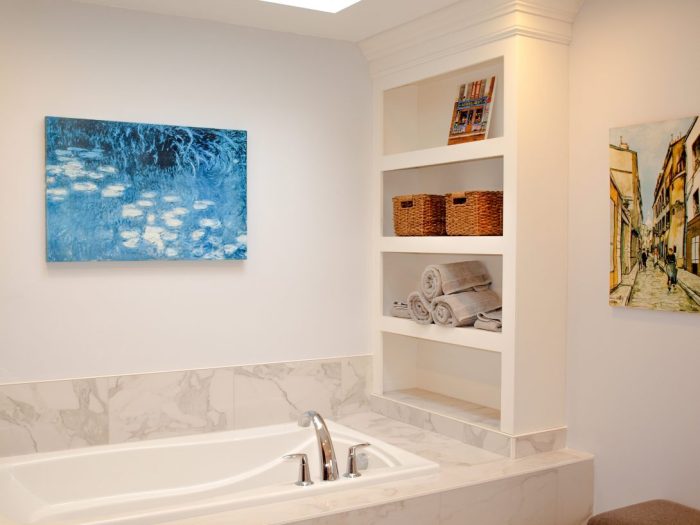 Unfinished bathroom with open shelves